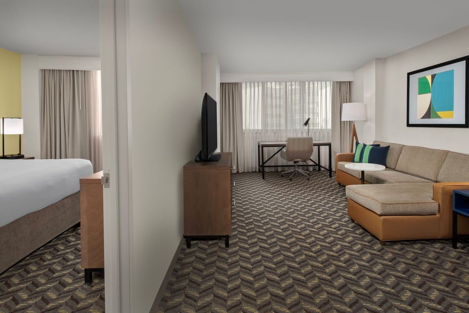 Suite, 1 Bedroom, Corner | Living room | 37-inch flat-screen TV with satellite channels, TV