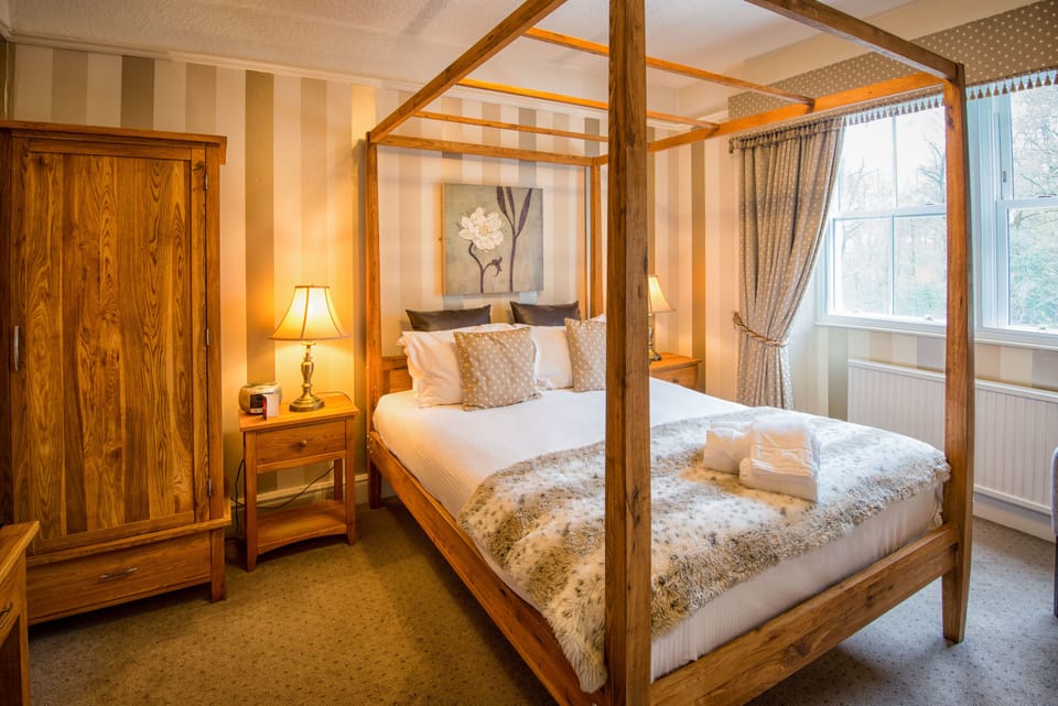 Four Poster Bedroom | Premium bedding, individually decorated, individually furnished