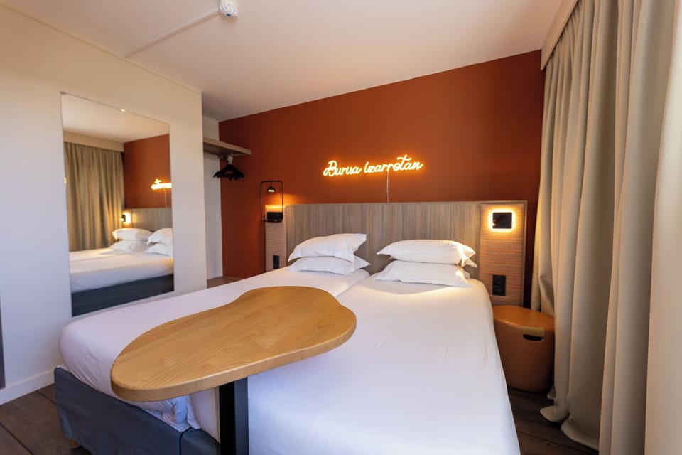 Classic Room, 2 Twin Beds | Down comforters, in-room safe, desk, laptop workspace