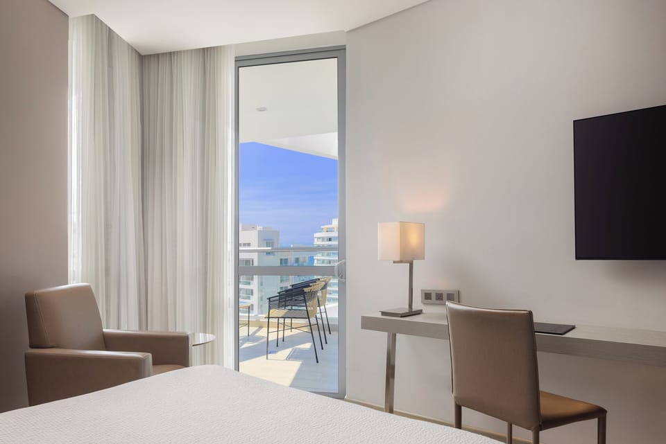 Room, 1 King Bed, Sea View (Balcony) | In-room safe, desk, soundproofing, iron/ironing board