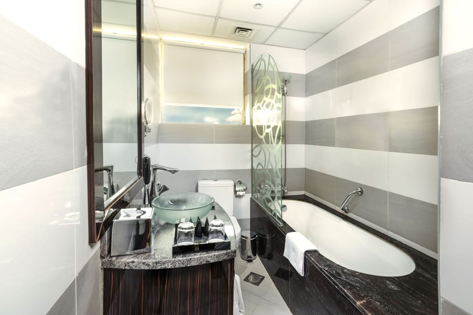 Combined shower/tub, free toiletries, hair dryer, bathrobes