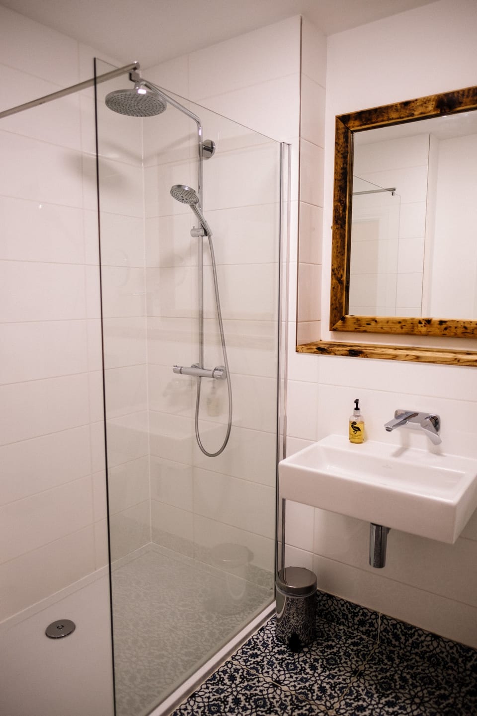 Shower, designer toiletries, hair dryer, towels