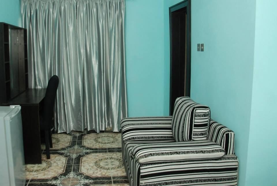 Premier Suite | Living area | Flat-screen TV
