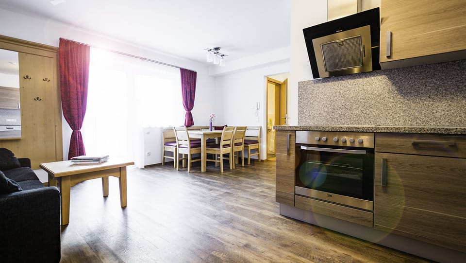 Apartment, 2 Bedrooms | Living area | Flat-screen TV
