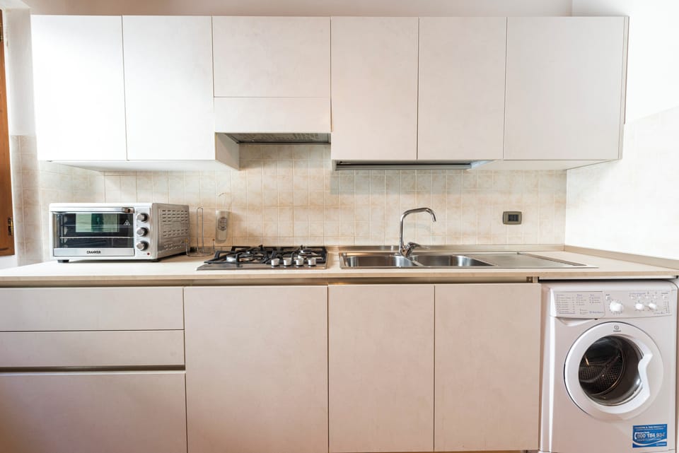 Comfort Apartment, 2 Bedrooms | Private kitchen | Full-size fridge, microwave, oven, stovetop