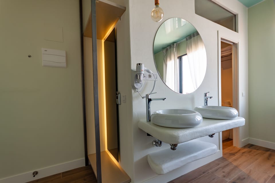 Triple Room, City View | Bathroom | Shower, free toiletries, hair dryer, towels