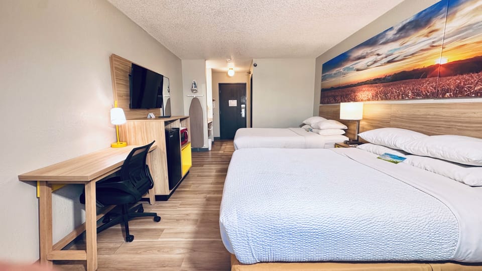 Standard Room, 2 Queen Beds | Desk, iron/ironing board, cribs (free), WiFi (free)