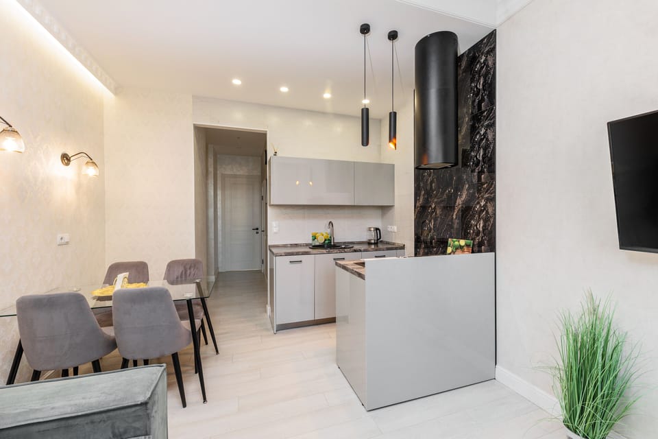 Design Apartment (Sverdlova Street 24) | Private kitchen | Coffee/tea maker, fridge, microwave, stovetop