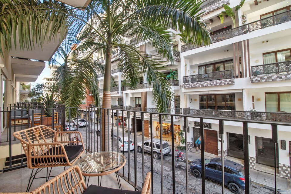 Private balcony overlooking the charming Old Town streets—perfect for enjoying your morning coffee.