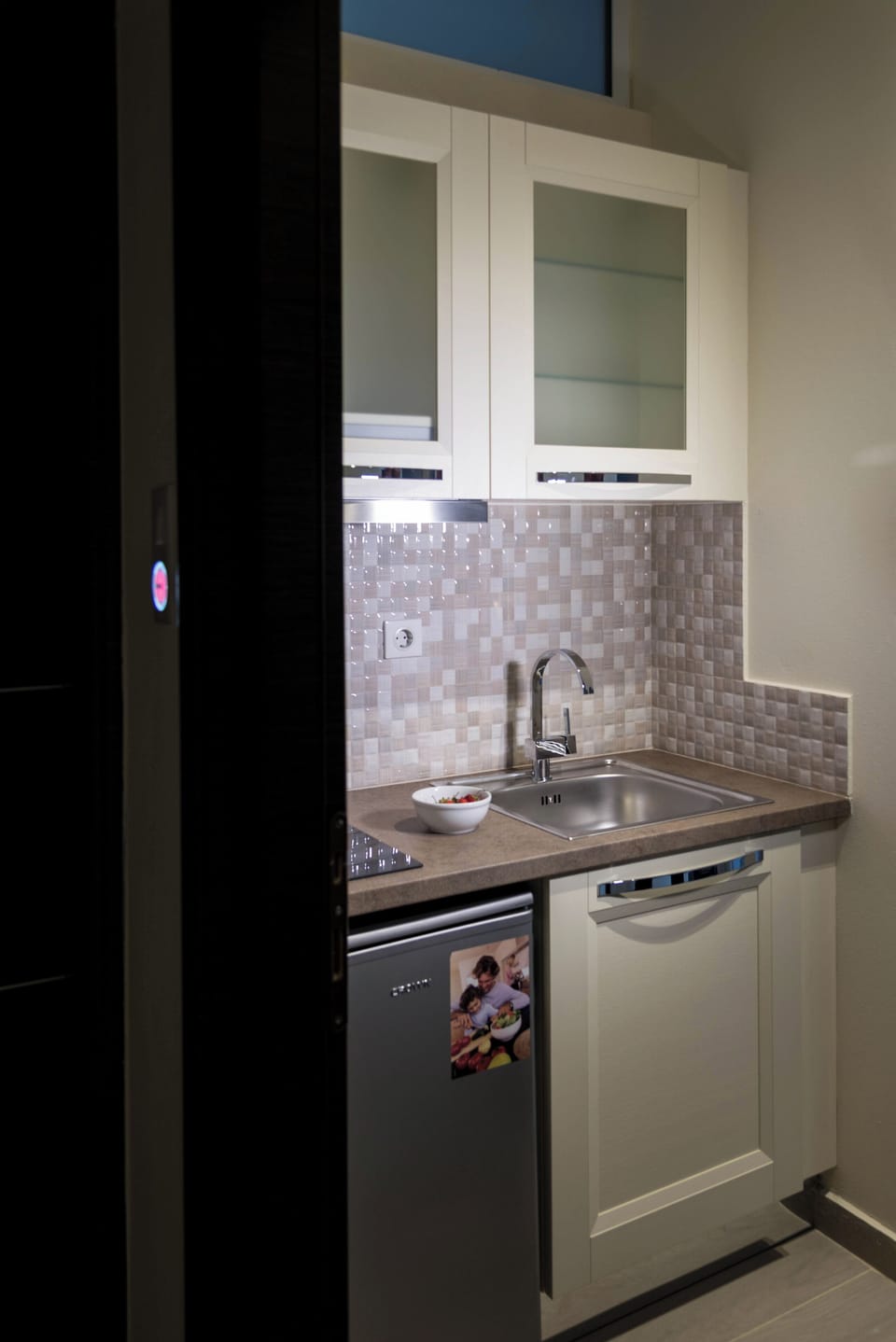 Mini-fridge, electric kettle, cookware/dishes/utensils