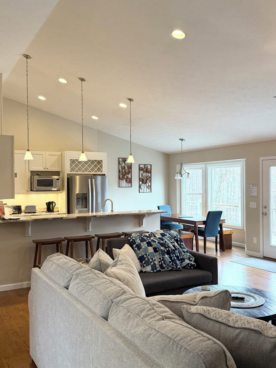 Open concept living, dining and kitchen space. 