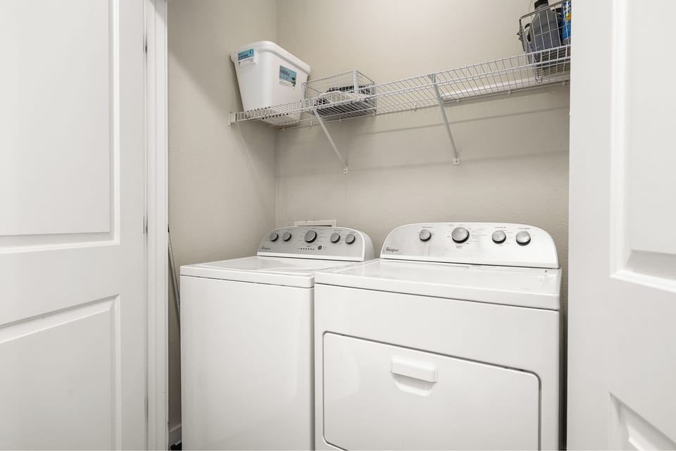 Full size washer and dryer inside the unit