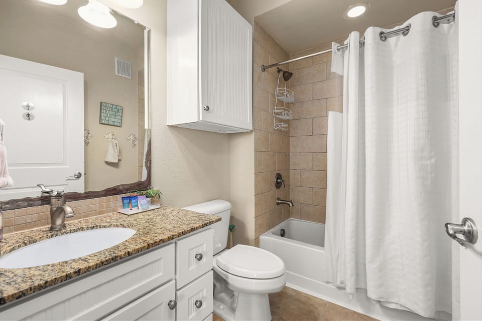 Hallway full bath. Shower/tub combo