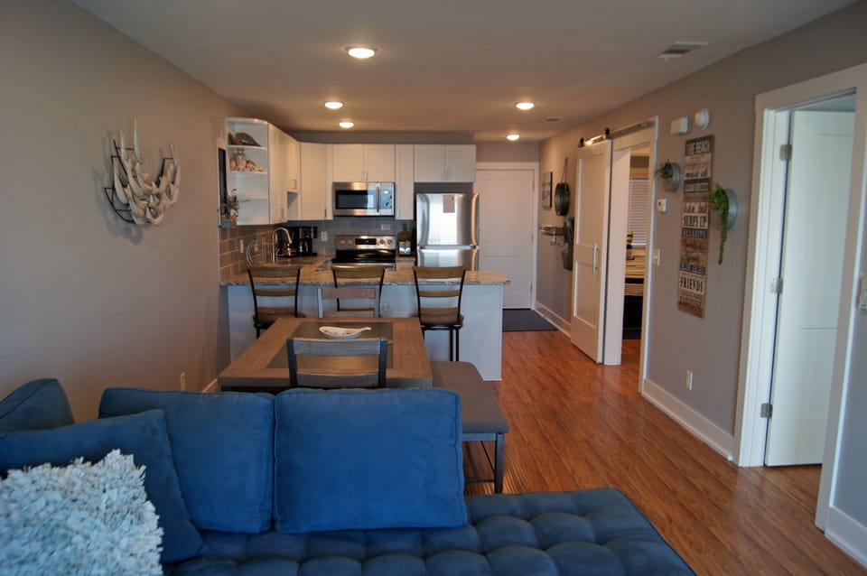 Condo, 2 Bedrooms | Living room | Flat-screen TV