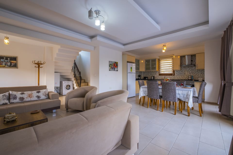 Villa, 4 Bedrooms (Opal 5) | Living area | Flat-screen TV