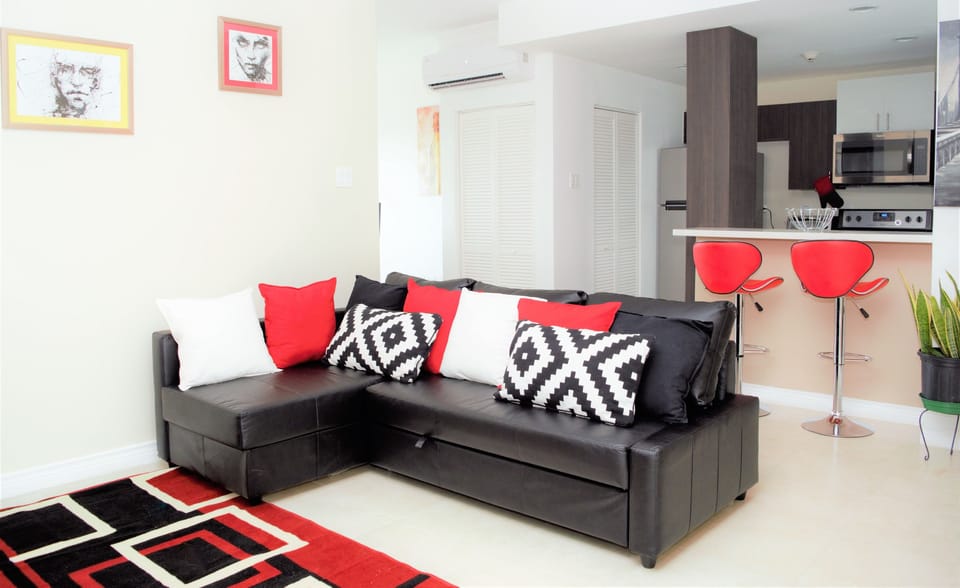 Luxury Apartment, 1 Bedroom, Pool Access, Pool View | Living room | 50-inch flat-screen TV with cable channels, TV, DVD player