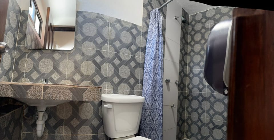 Twin Room | Bathroom | Shower, towels, soap, shampoo