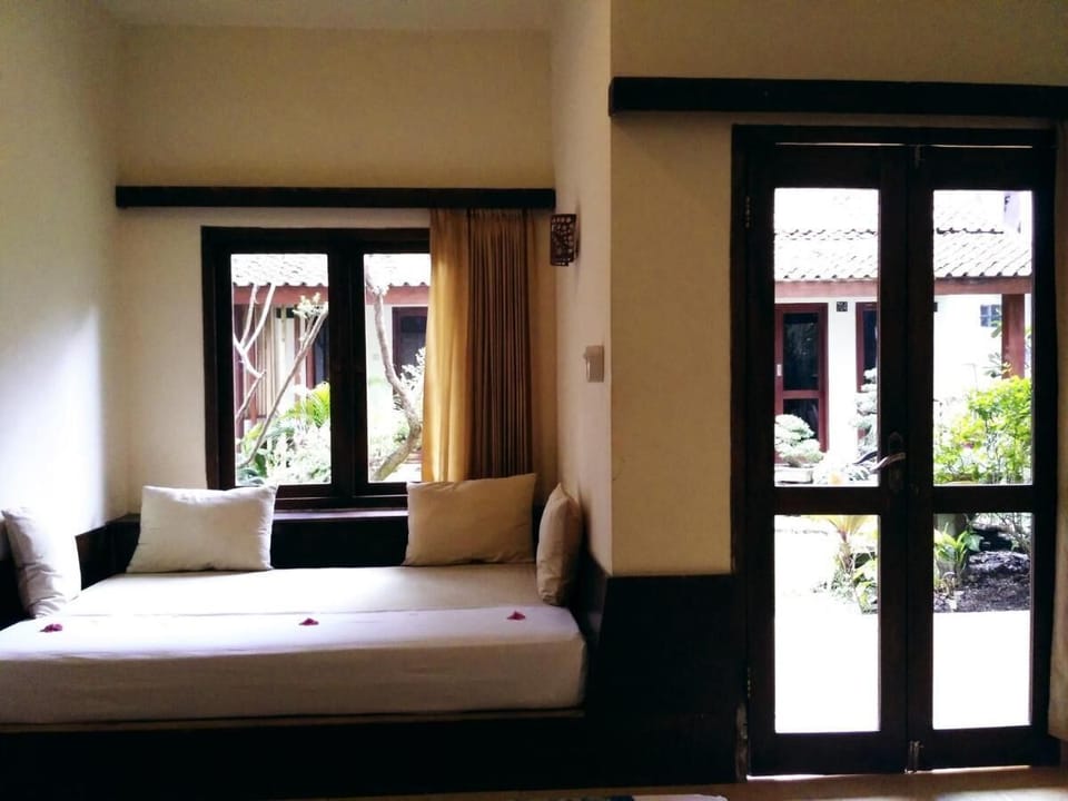 Family Double Room, Garden View | Minibar, WiFi (free)