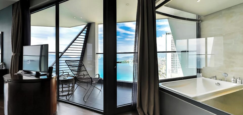 Premium Triple Room, Ocean View | Bathroom | Free toiletries, hair dryer, bathrobes, slippers