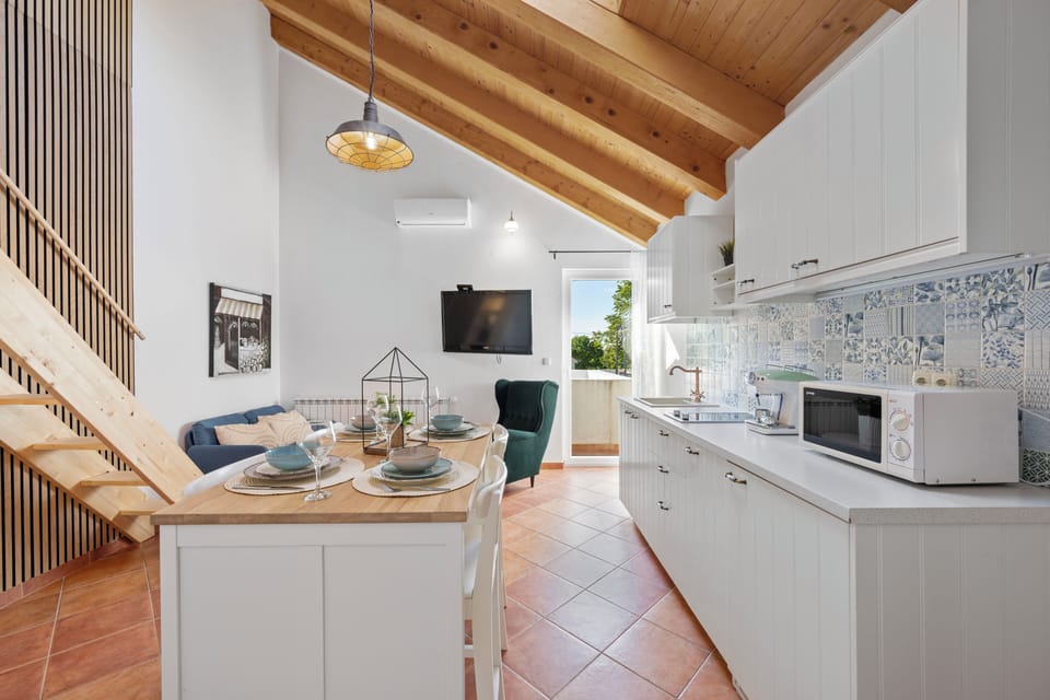 Family Apartment | Private kitchen | Oven, espresso maker, electric kettle, cookware/dishes/utensils
