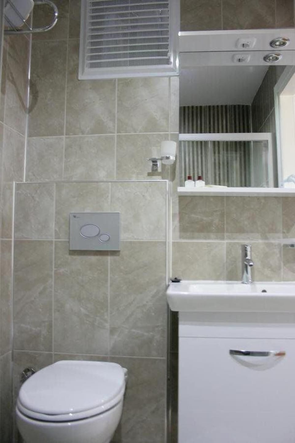 Shower, free toiletries, hair dryer, slippers