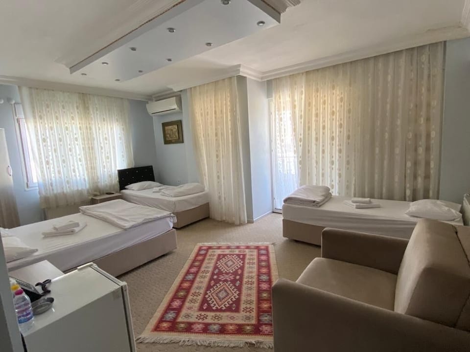 Standard Triple Room | Minibar, in-room safe, free WiFi, bed sheets