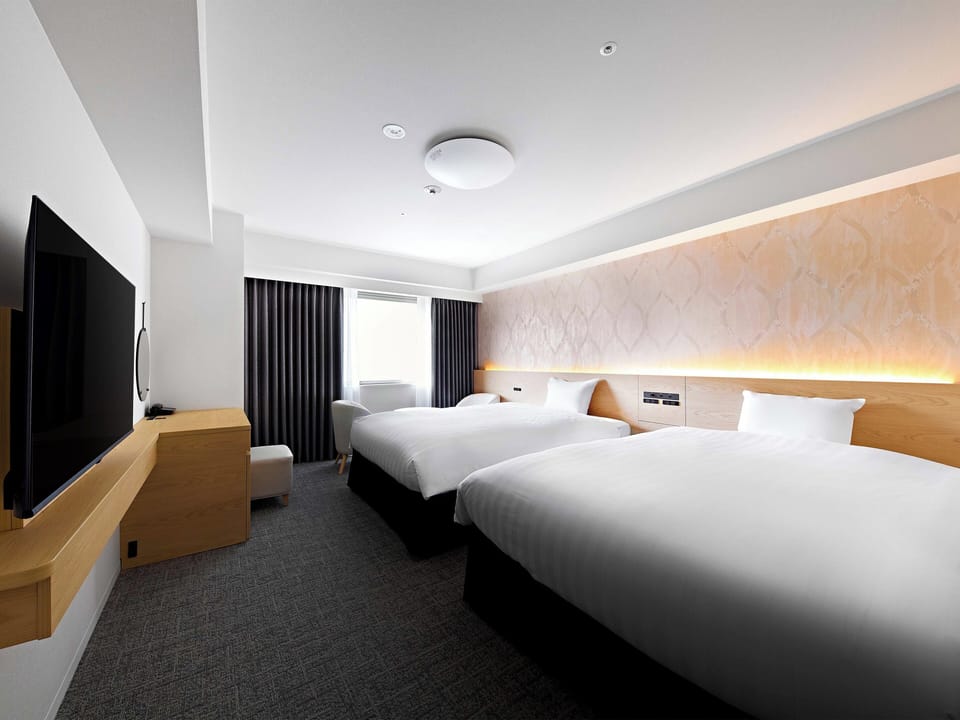 Deluxe Twin Room, 2 Double Beds, Non Smoking | Down comforters, blackout drapes, free WiFi, bed sheets