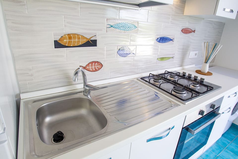 Apartment | Private kitchen | Fridge, oven, stovetop, cookware/dishes/utensils