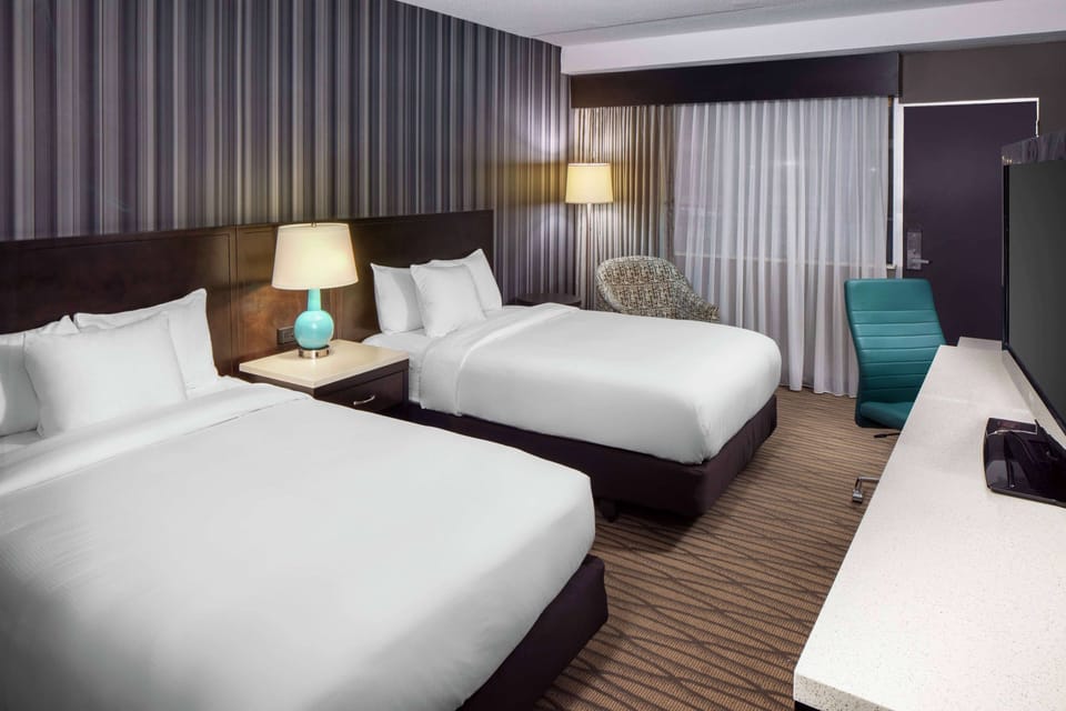 Room, 2 Double Beds, Non Smoking (Poolside) | In-room safe, desk, laptop workspace, blackout drapes