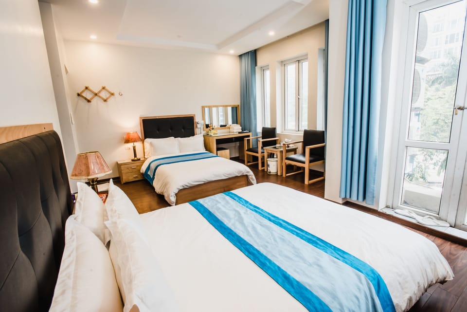 Family Triple Room | Minibar, desk, iron/ironing board, free WiFi