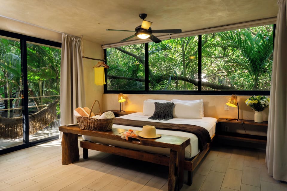 Suite, 1 King Bed | In-room safe, blackout drapes, free WiFi, bed sheets