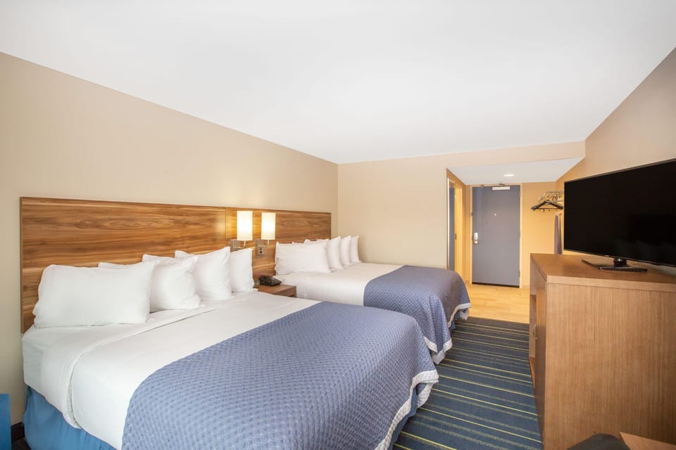 Room, 2 Queen Beds, Mobility Accessible, Non Smoking (Bathtub W/grab Bars) | Pillowtop beds, desk, blackout drapes, iron/ironing board