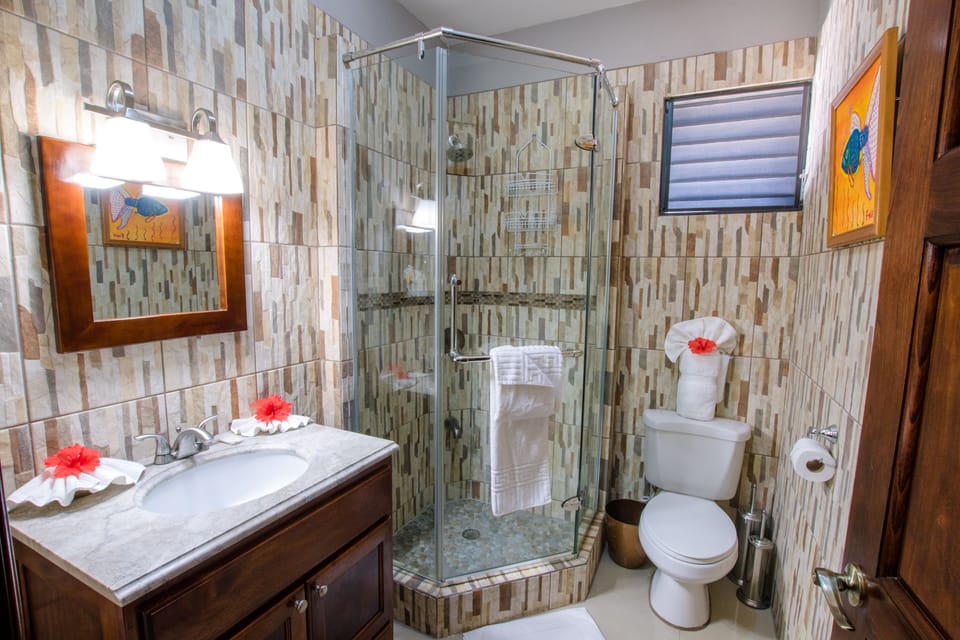 Bathroom with toiletry and blow dryer 