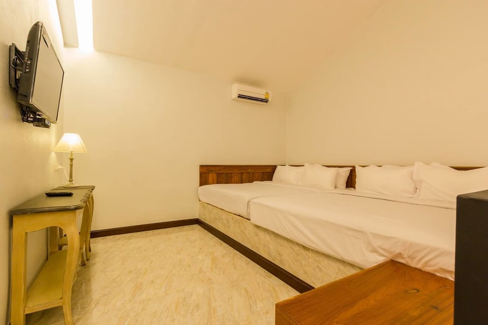 Family Room | Hypo-allergenic bedding, minibar, in-room safe, desk
