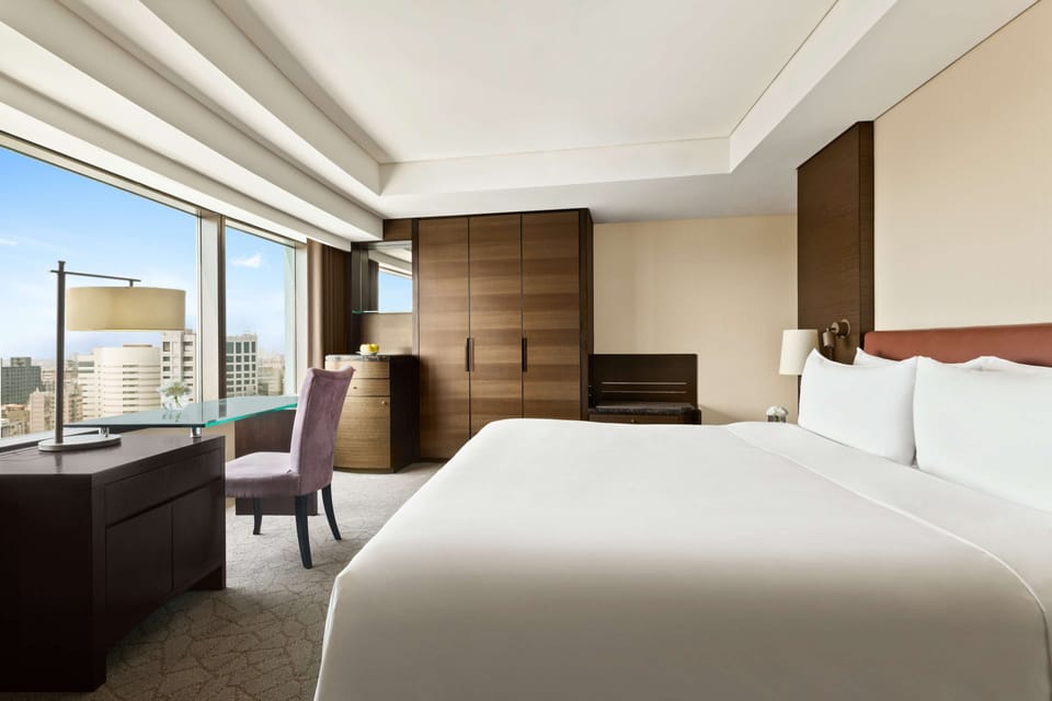 Premium bedding, down comforters, pillowtop beds, in-room safe