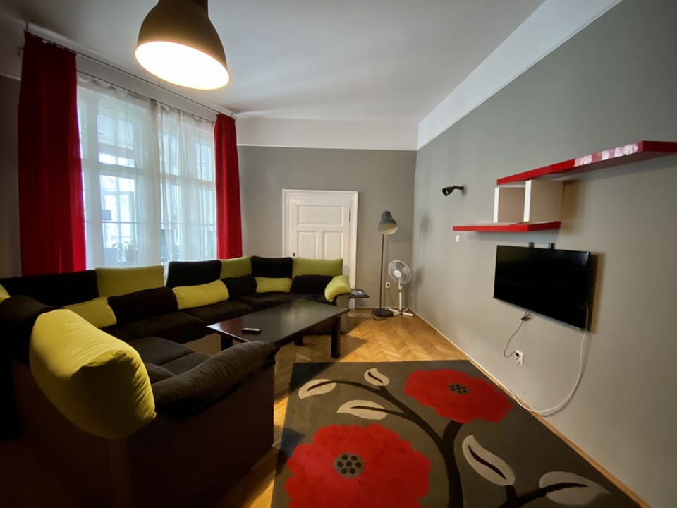 Grand Apartment | Living area | Flat-screen TV