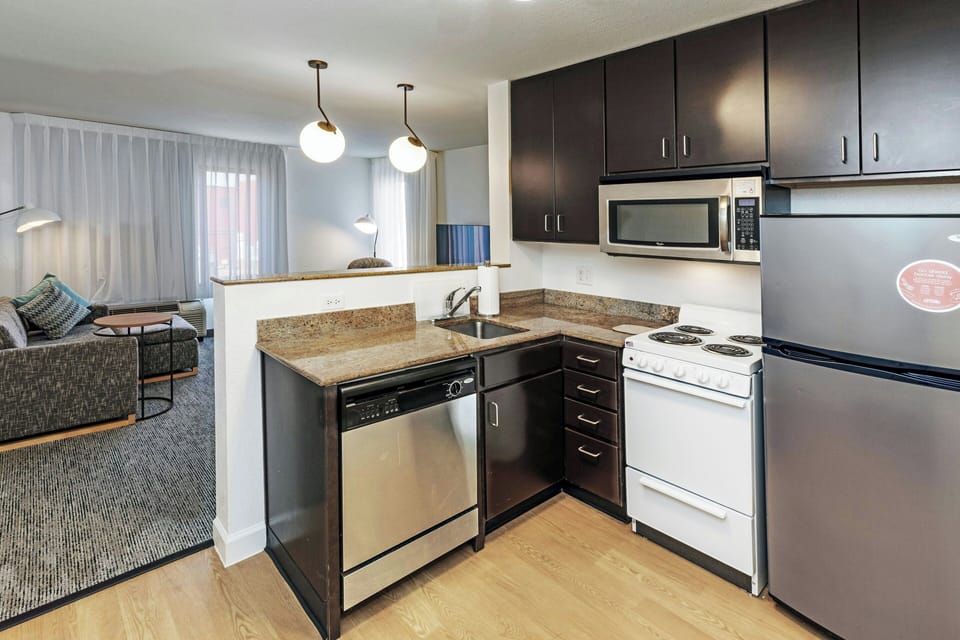 Suite, 2 Bedrooms | Desk, laptop workspace, iron/ironing board, free WiFi
