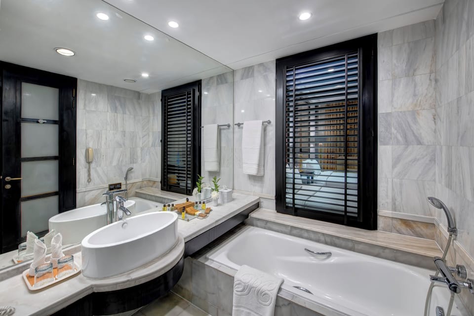 Executive Double Room | Minibar, in-room safe, desk, iron/ironing board (on request)