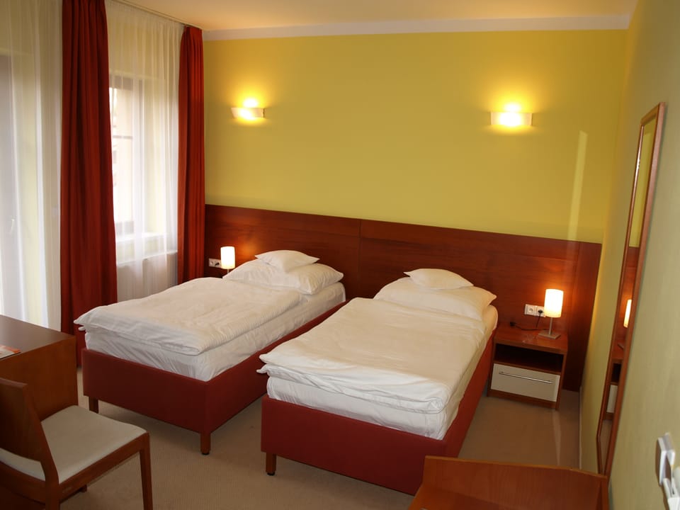 Double or Twin Room | Minibar, in-room safe, desk, blackout drapes