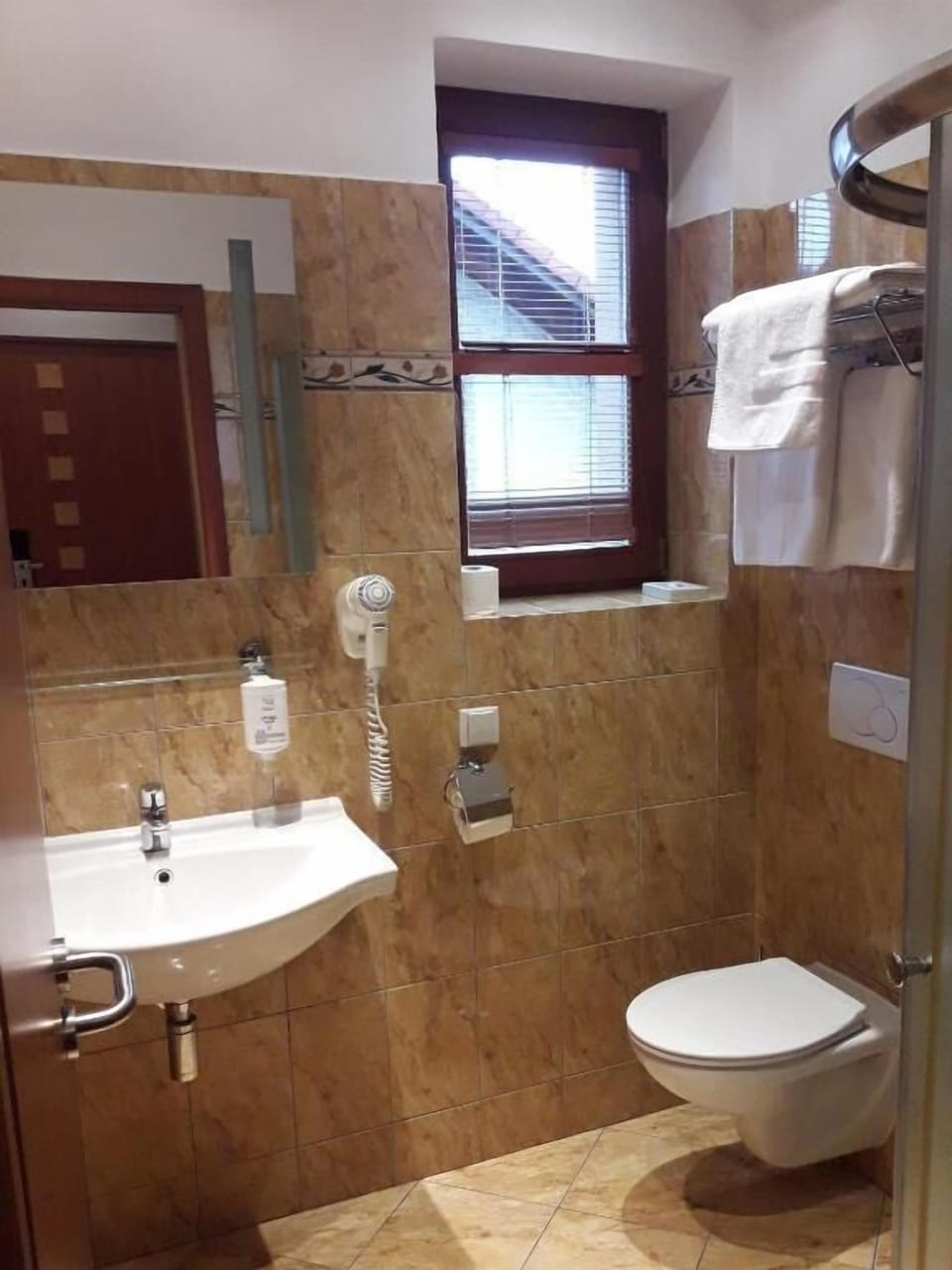 Shower, deep soaking tub, free toiletries, hair dryer