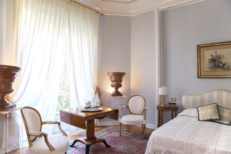 Quadruple Room | Minibar, in-room safe, desk, soundproofing