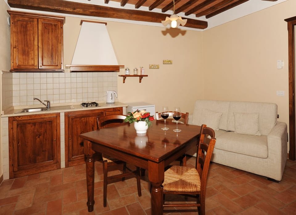 Apartment, 1 Bedroom | Living area | Flat-screen TV
