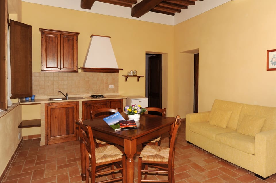 Apartment, 2 Bedrooms | Living area | Flat-screen TV