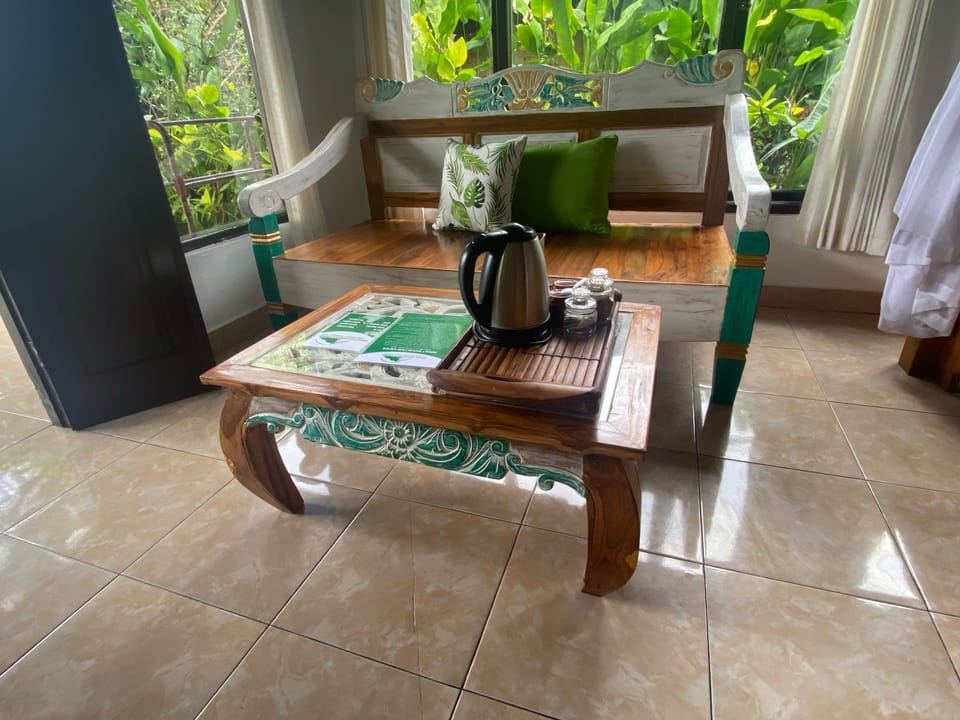 Superior Triple Room, Multiple Beds, Garden View, Garden Area | Living area