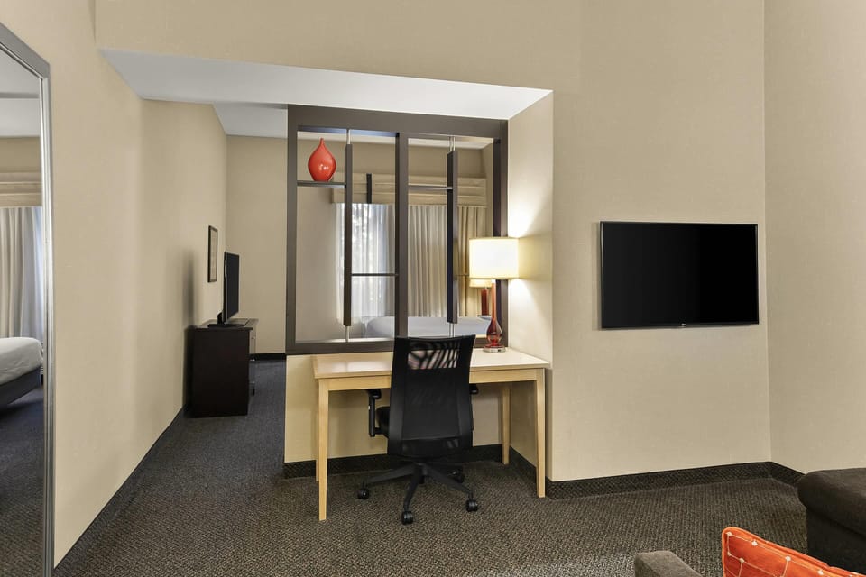 Premium bedding, pillowtop beds, desk, laptop workspace