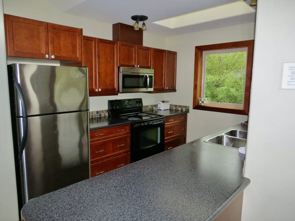 Premium Suite, 2 Bedrooms (Sandpiper) | Private kitchen | Coffee/tea maker, electric kettle, paper towels