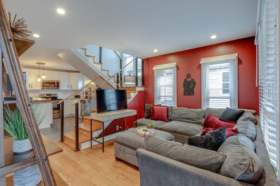 Bright open-concept living area + modern kitchen