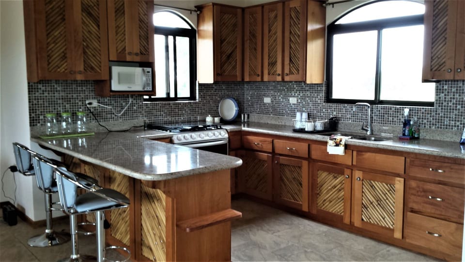 Our custom designed kitchen where we whip up meals to enjoy with family/friends.