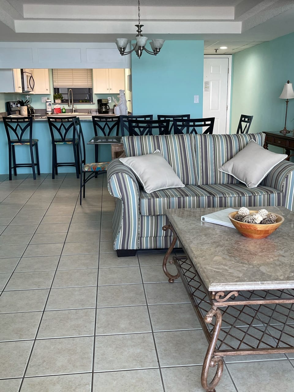 Den, entrance and kitchen.  Note UNOBSTRUCTED beach and pool views