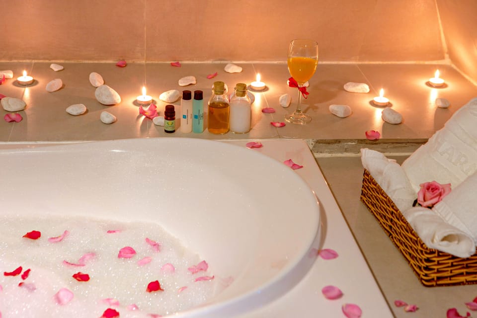 Suite, 1 King Bed | Bathroom | Shower, free toiletries, hair dryer, slippers